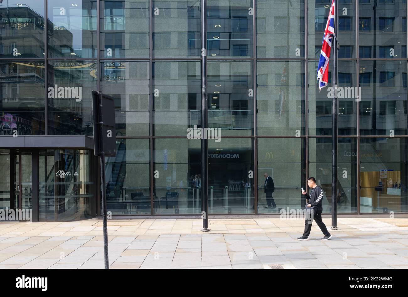 THe British flag, the Union Jack, at halfmast outside Coutts * Co bank