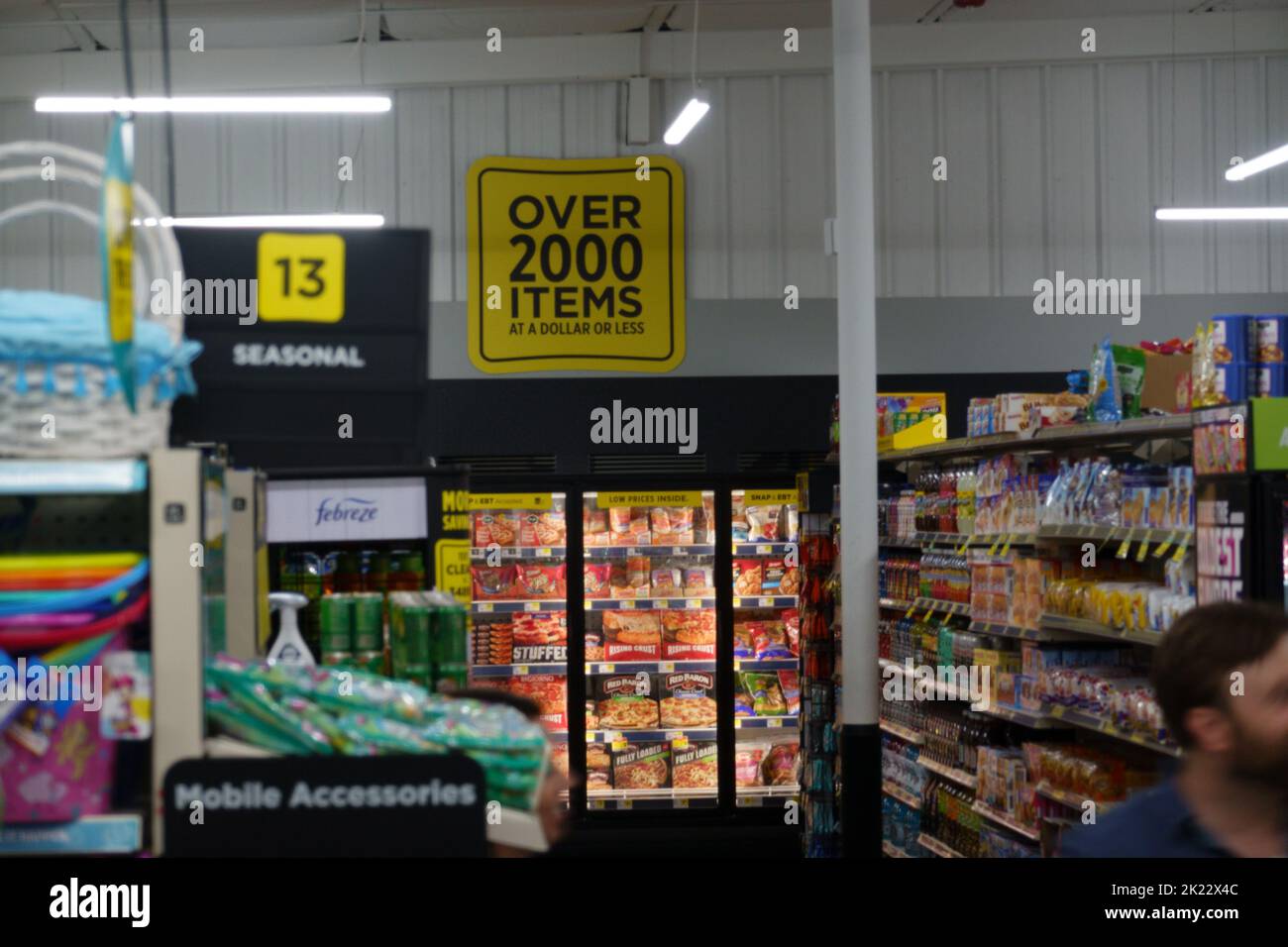 The aisles of a Dollar General with the frozen section Stock Photo Alamy