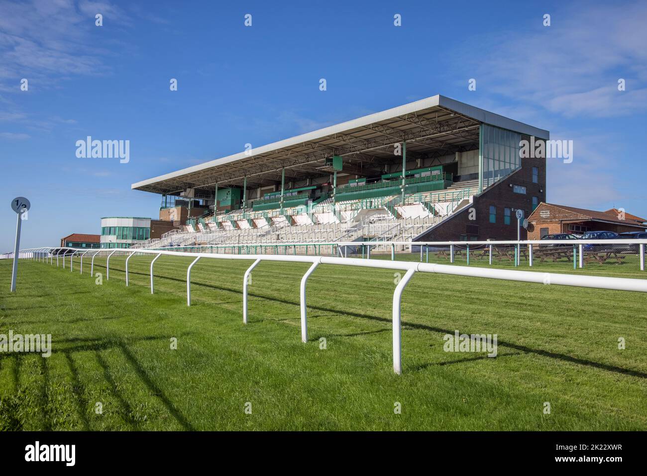 the grandstand at brighton racecourse on the edge of the south downs in east sussex Stock Photo