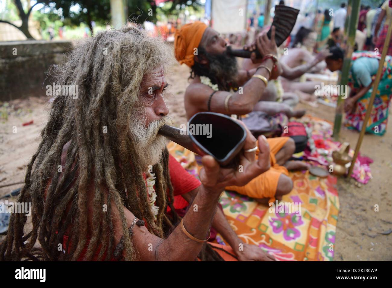 Naga Sadhus (Naked Yogis) perform different religious practices during 'Kumbh Mela' in Ranirbazar, Agartala. Kumbh Mela or Kumbha Mela is a major pilgrimage and festival in Hinduism. It is celebrated in a cycle of approximately 12 years, to celebrate every revolution Brihaspati completes. Tripura, India. Stock Photo