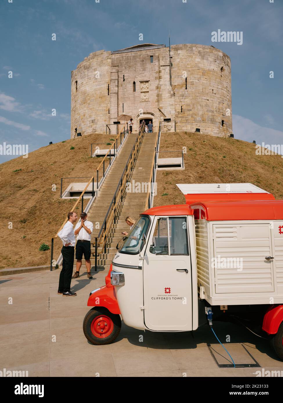 Summer tourists visiting the newly opened Clifford's Tower / York castle, York, North Yorkshire, England, UK - English Heritage tourism Stock Photo