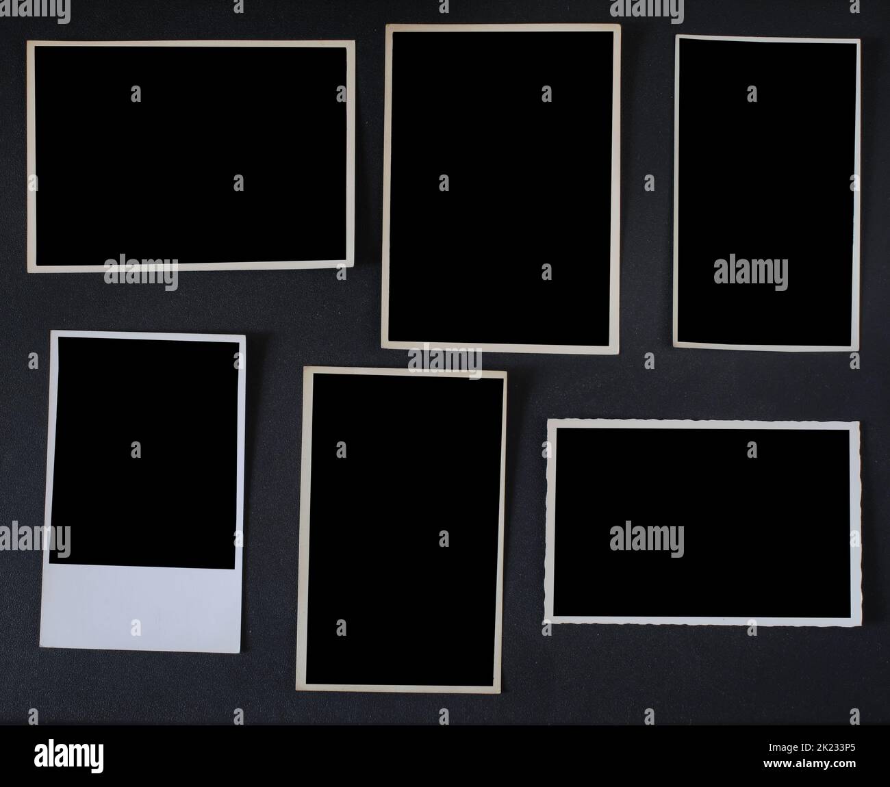 old empty photo frames, vintage photo prints, flat lay with free pics