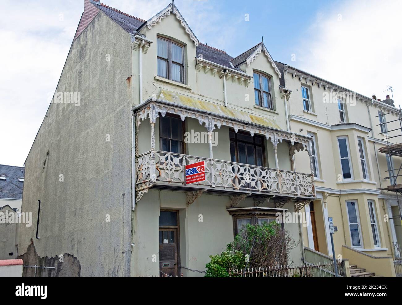 Birt Estate agent sign on exterior of large house property in Tenby Pembrokeshire Wales UK Great Britain  KATHY DEWITT Stock Photo