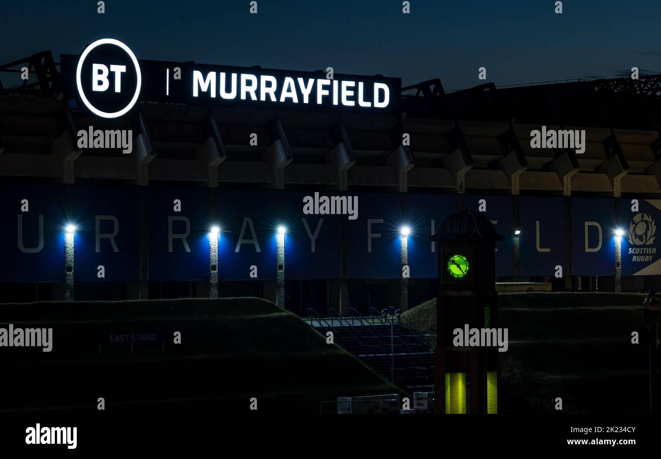 BT Murrayfield rugby stadium logo lit up in darkness at night, Edinburgh, Scotland, UK Stock Photo