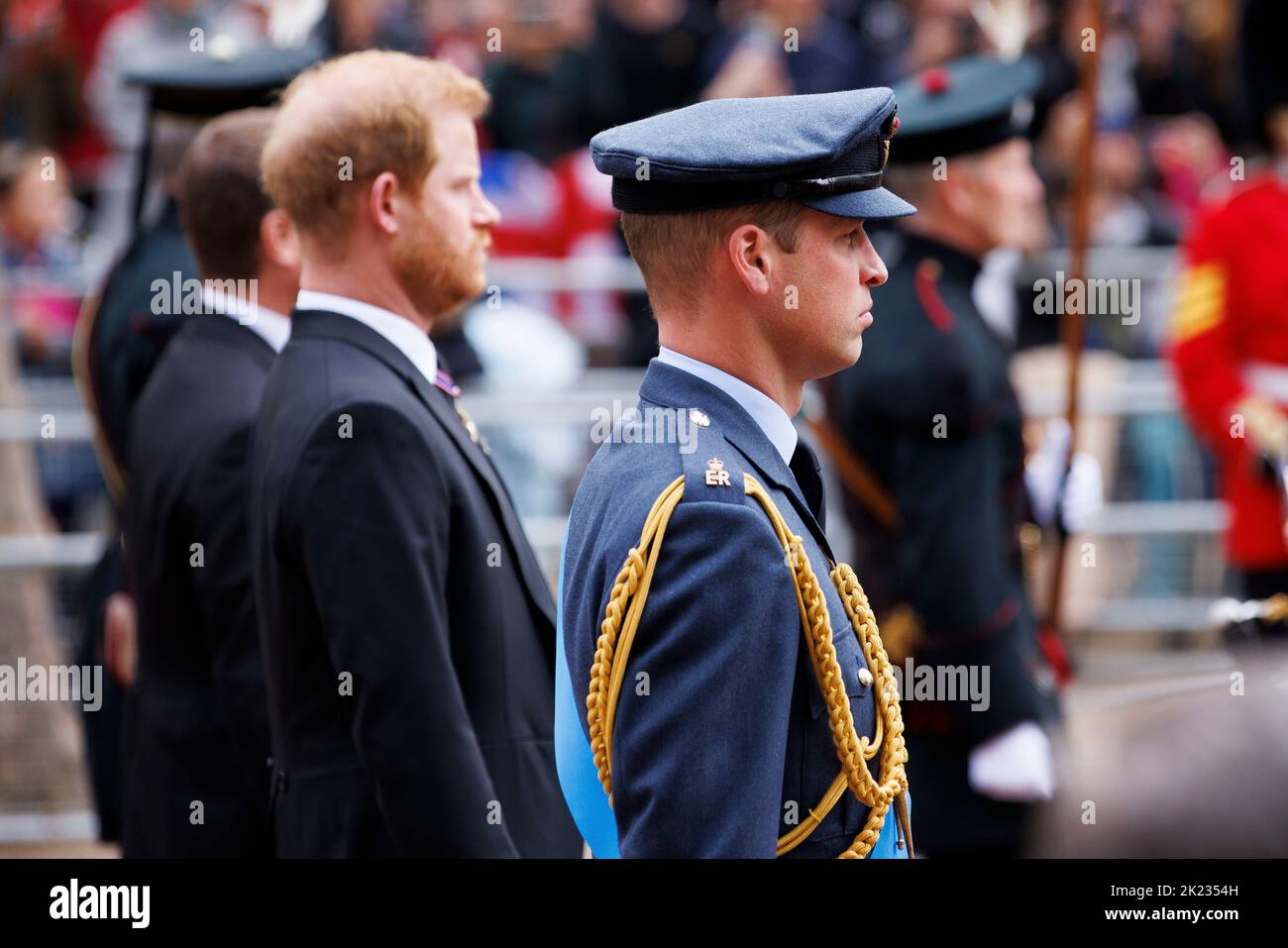 The State Funeral of Her Majesty Queen Elizabeth II, seen from The Mall. Prince William the Prince of Wales and Prince Harry Duke of Sussex walk behin Stock Photo