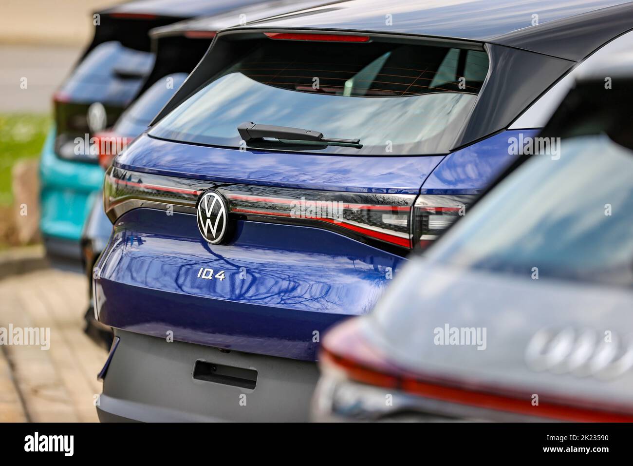 Zwickau, Germany. 26th Apr, 2022. A VW ID.3 (l-r), Seat Cupra Born, VW ID.4 and Audi Q4 e-tron stand on Volkswagen's factory premises in Zwickau. In addition to VW vehicles, vehicles from the Group's Audi and Seat brands also come off the production line at the plant. The vehicles are based on the Modular Electric Toolkit. Volkswagen has converted the site, which employs around 9,000 people, into a pure electric vehicle factory at a cost of 1.2 billion euros. Credit: Jan Woitas/dpa/Alamy Live News Stock Photo