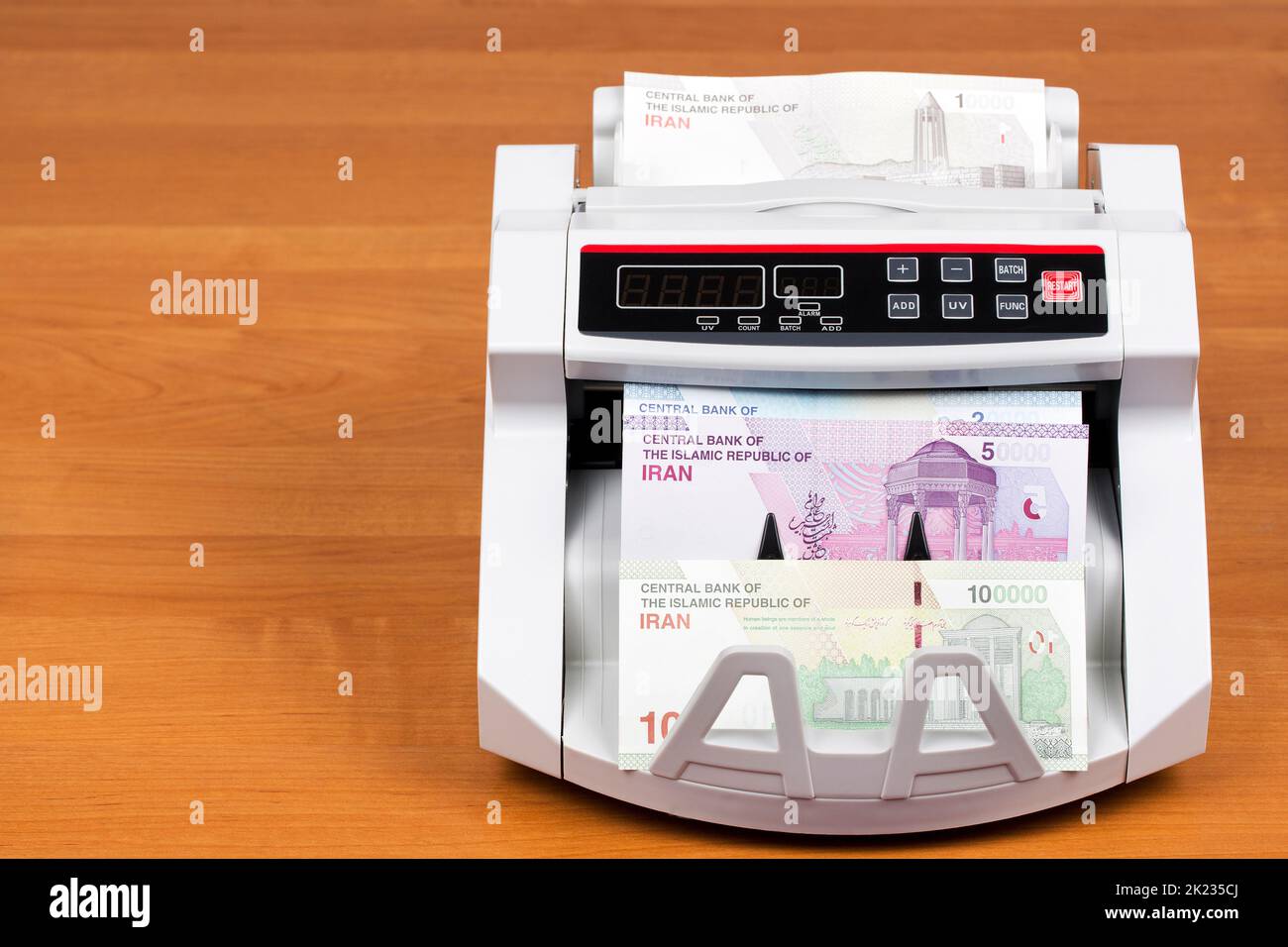 Iranian money - Toman in the counting machine Stock Photo