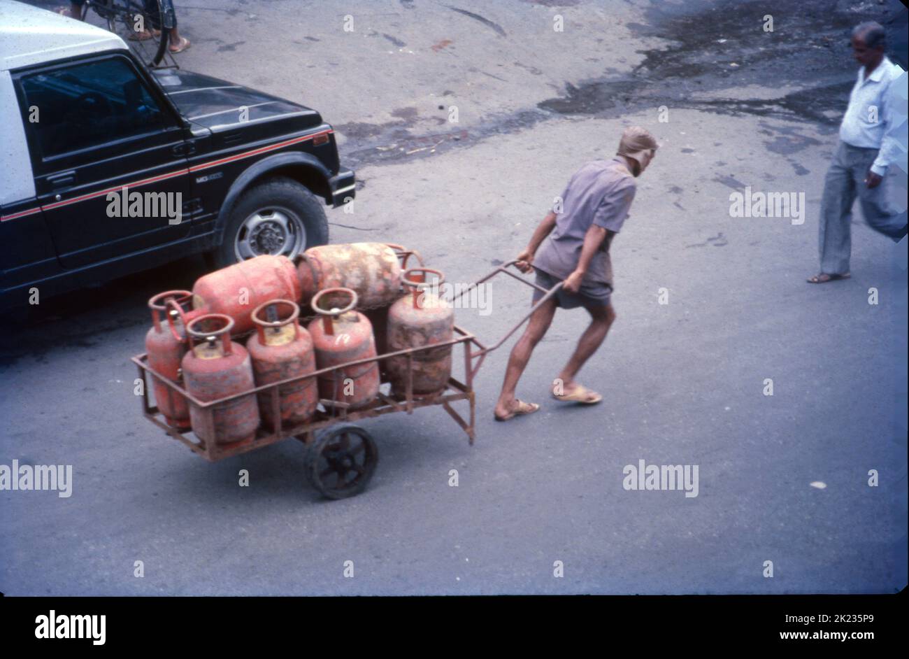 Gas Delivery Man, Pulling the Cart, Mumbai Stock Photo Alamy