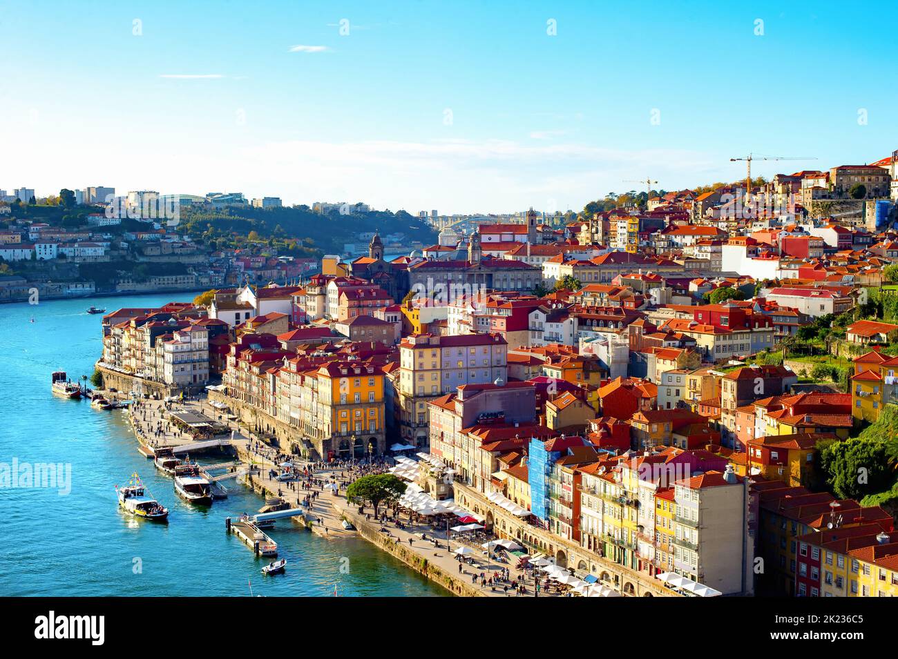 Aerial cityscape with Ribeira view in sunset light, boats at Douro river, Porto, Portugal Stock Photo