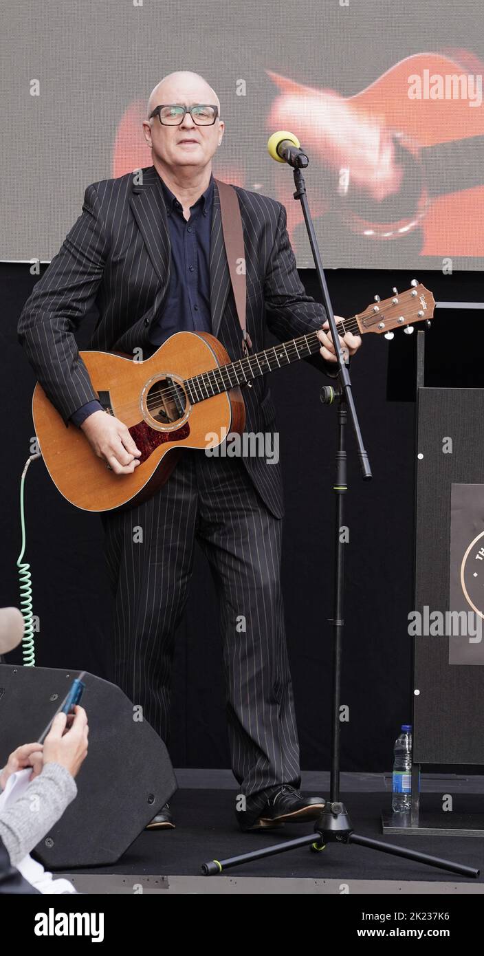 Kevin Armstrong performing during the unveiling of a stone for David Bowie on the Music Walk of Fame at Camden, north London. Picture date: Thursday September 22, 2022. Stock Photo