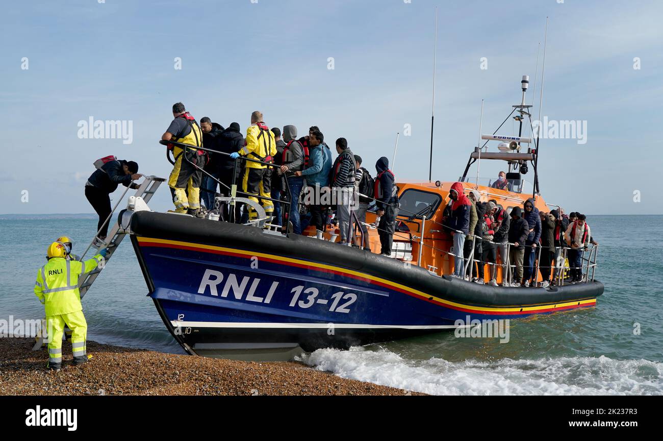 A group of people thought to be migrants arrive in Dungeness, Kent, after being rescued in the Channel by the RNLI following following a small boat incident. Picture date: Thursday September 22, 2022. Stock Photo
