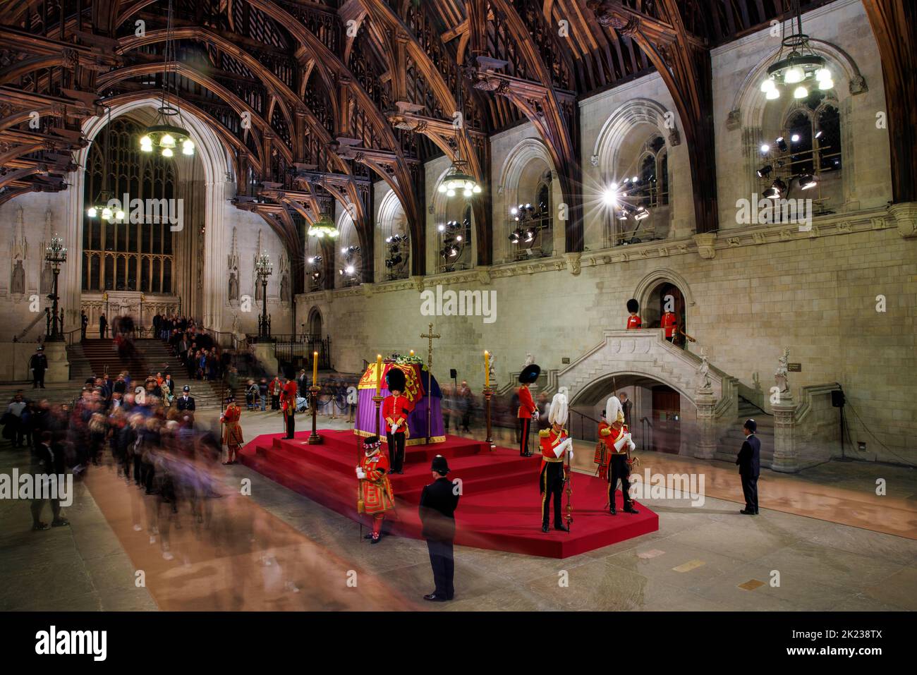Members of the public who have queued through the night walk past the coffin of Her Majesty Queen Elizabeth II as the late monarch lies in state in We Stock Photo