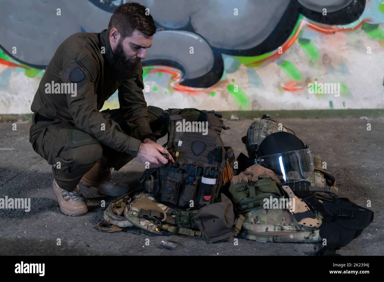 Army body armor, helmet and ammunition, Kalashnikov assault rifle with