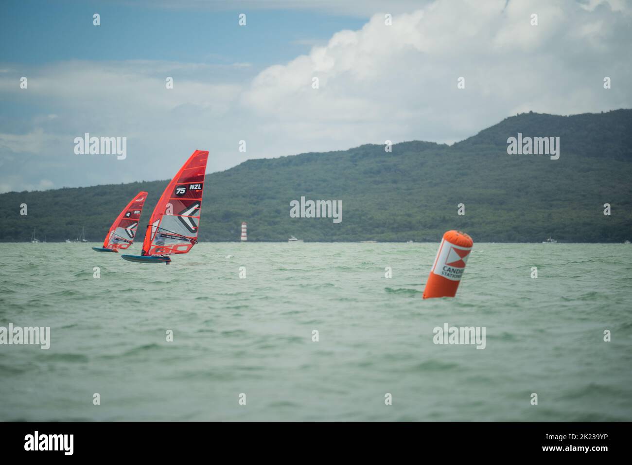 Competitors race in a national windsurfing hydrofoil race at the