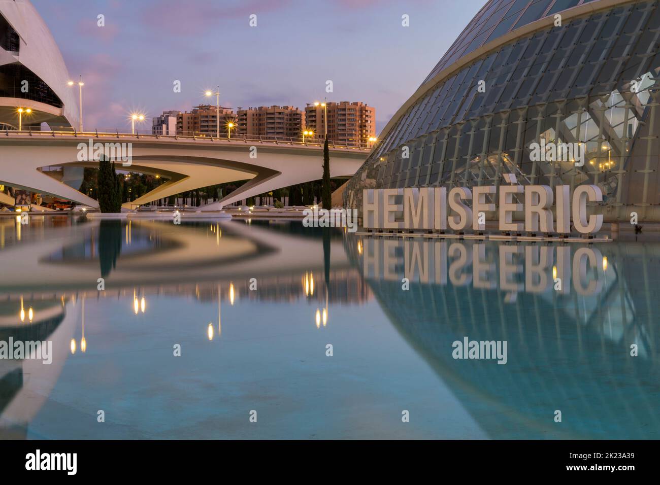 Hemisfèric, a digital 3D cinema & planetarium, by Montolivet Bridge at City of Arts and Sciences in Valencia, Spain at dawn in September Stock Photo
