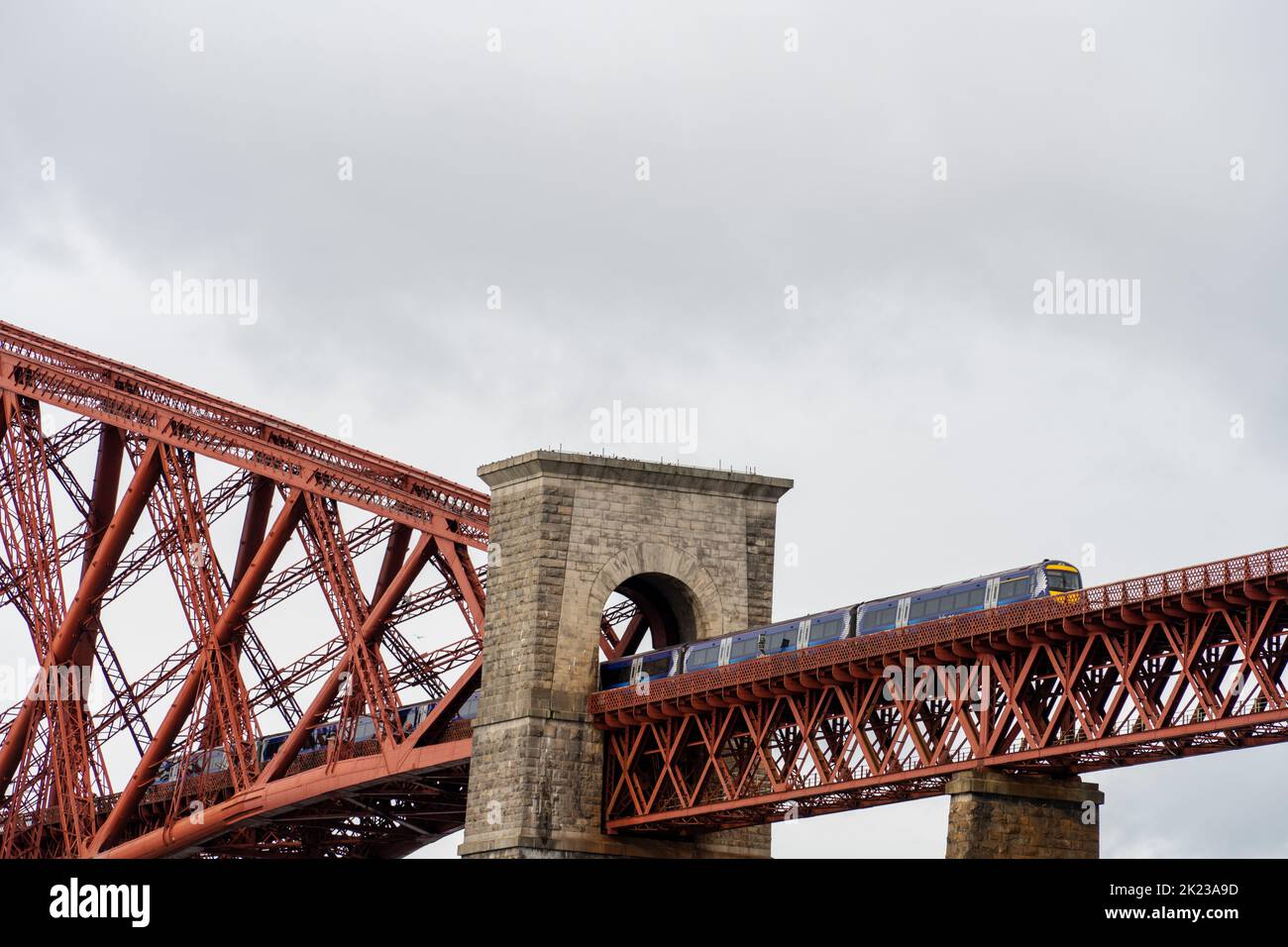 A ScotRail train travels over the Forth Rail Bridge. Strike action by rail unions is expected in the coming months. Stock Photo
