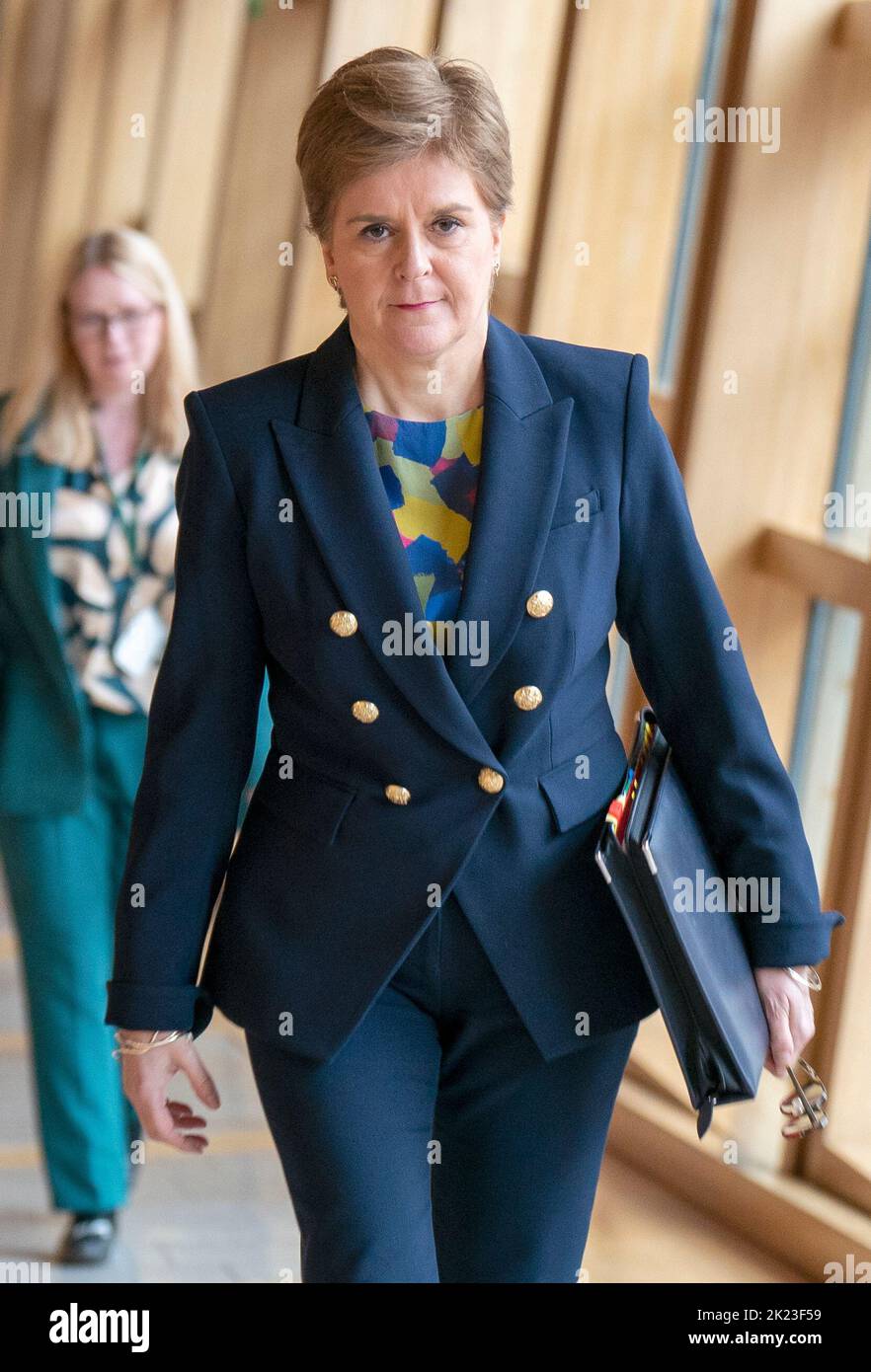 First Minister Nicola Sturgeon arrives ahead of First Minster's Questions (FMQ's) in the debating chamber of the Scottish Parliament in Edinburgh. Picture date: Thursday September 22, 2022. Stock Photo