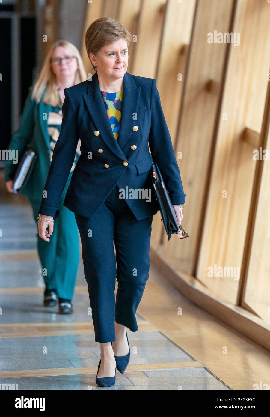 First Minister Nicola Sturgeon arrives ahead of First Minster's Questions (FMQ's) in the debating chamber of the Scottish Parliament in Edinburgh. Picture date: Thursday September 22, 2022. Stock Photo