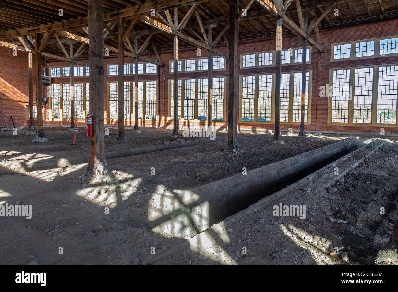 Evanston, Wyoming - The historic roundhouse and railyards, built by the Union Pacific Railroad in 1912. The building had 28 bays for railcar and locom Stock Photo