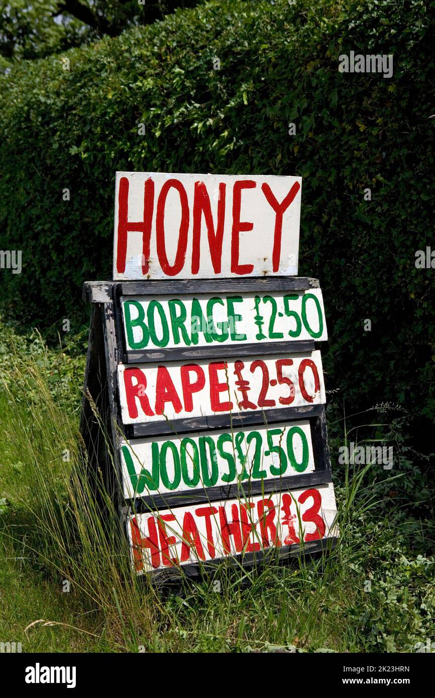 Bee hive sign advertising local honey for sale in Lincolnshire, England Stock Photo