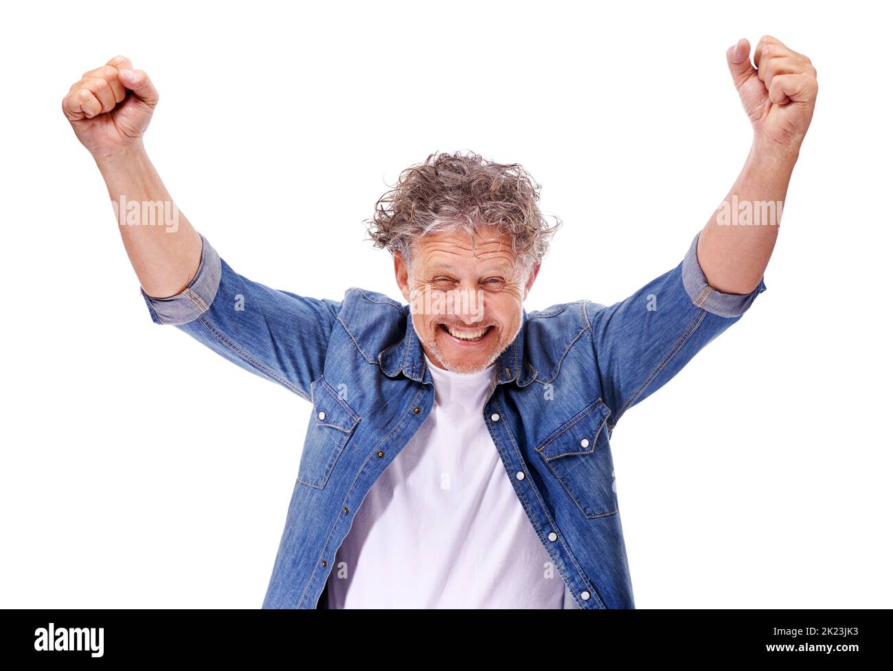 Feeling like a winner. Studio shot of an enthusiastic mature man with his arms raised isolated on white. Stock Photo