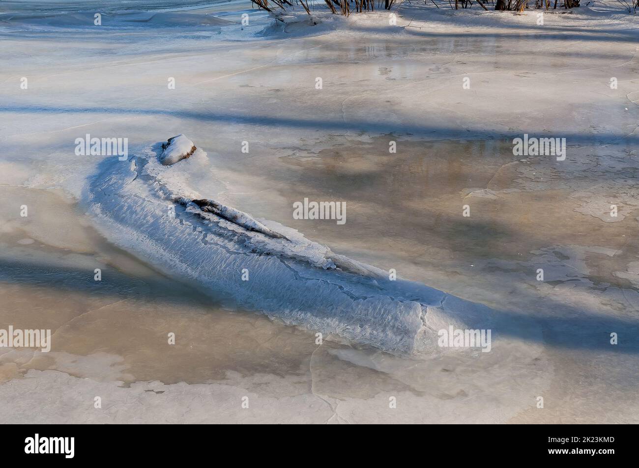 Detail of the frozen Dnieper river in Kiev capital of Ukraine, snow, ice and water creating a nice texture effect Stock Photo