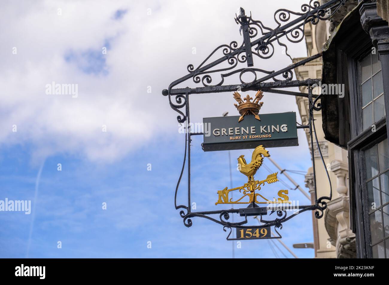 LONDON - May 21, 2022: Traditional old pub sign on side of building on Fleet Street Stock Photo