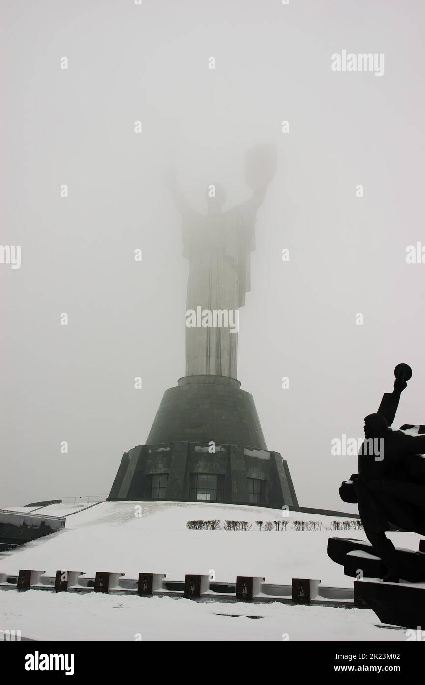 The huge Motherland Statue in Kiev the capital of Ukraine, vanishes in the winter fog Stock Photo