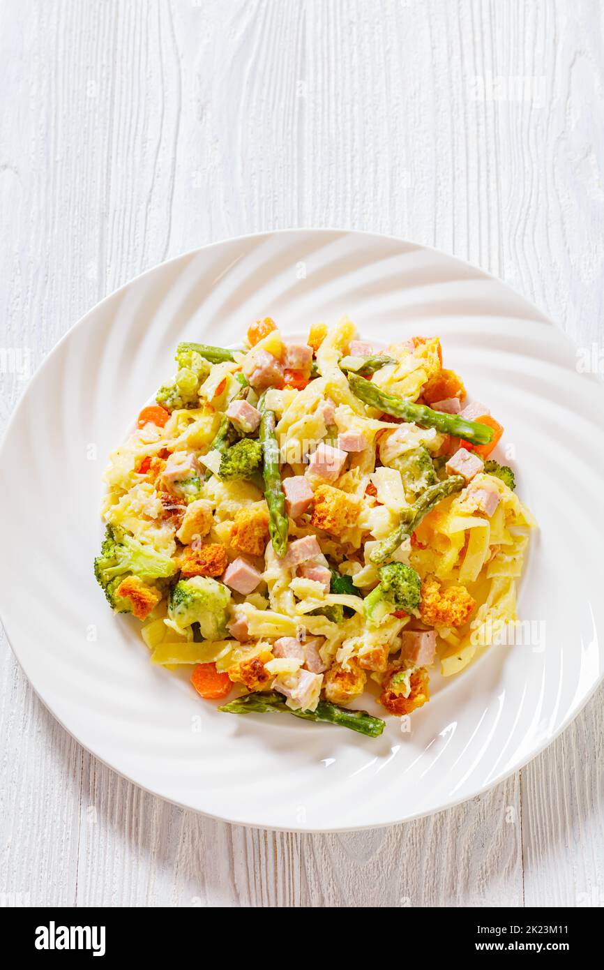 Ham and Noodle Casserole with egg noodles, chopped ham, carrots