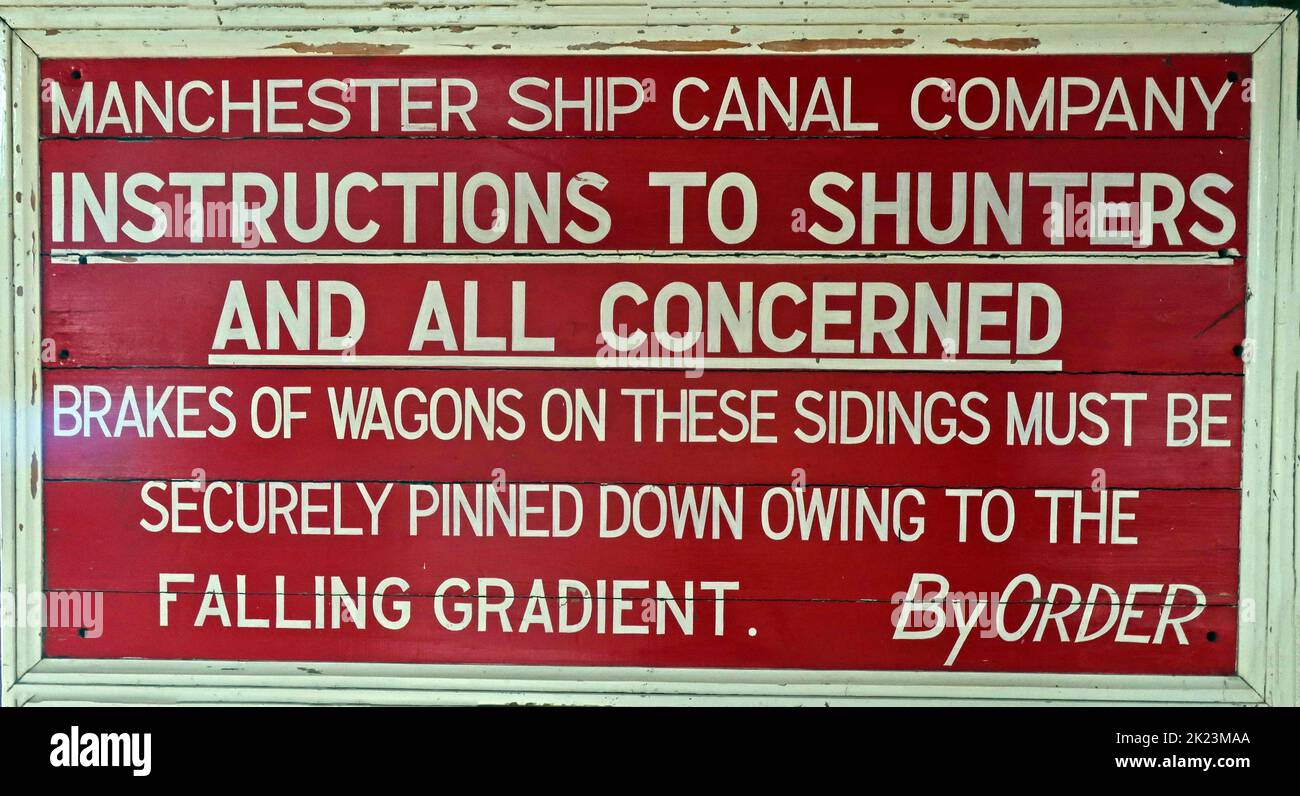 Manchester Ship canal Company sign - Instructions to shunters and all concerned. Brakes of wagons on these sidings must be securely pinned down Stock Photo