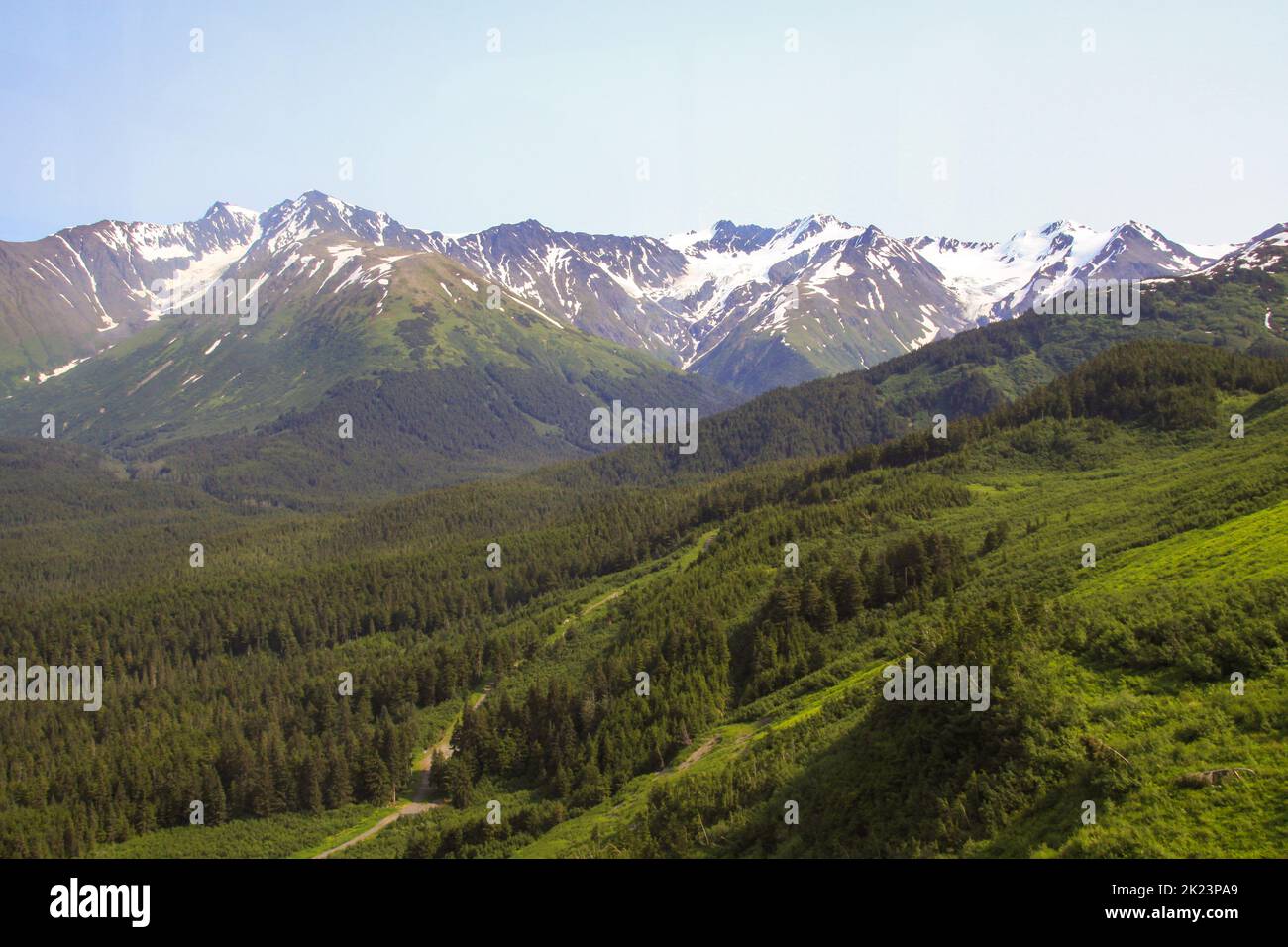 Snow covered mountain peaks Photographed near Homer, Alaska. Homer is a