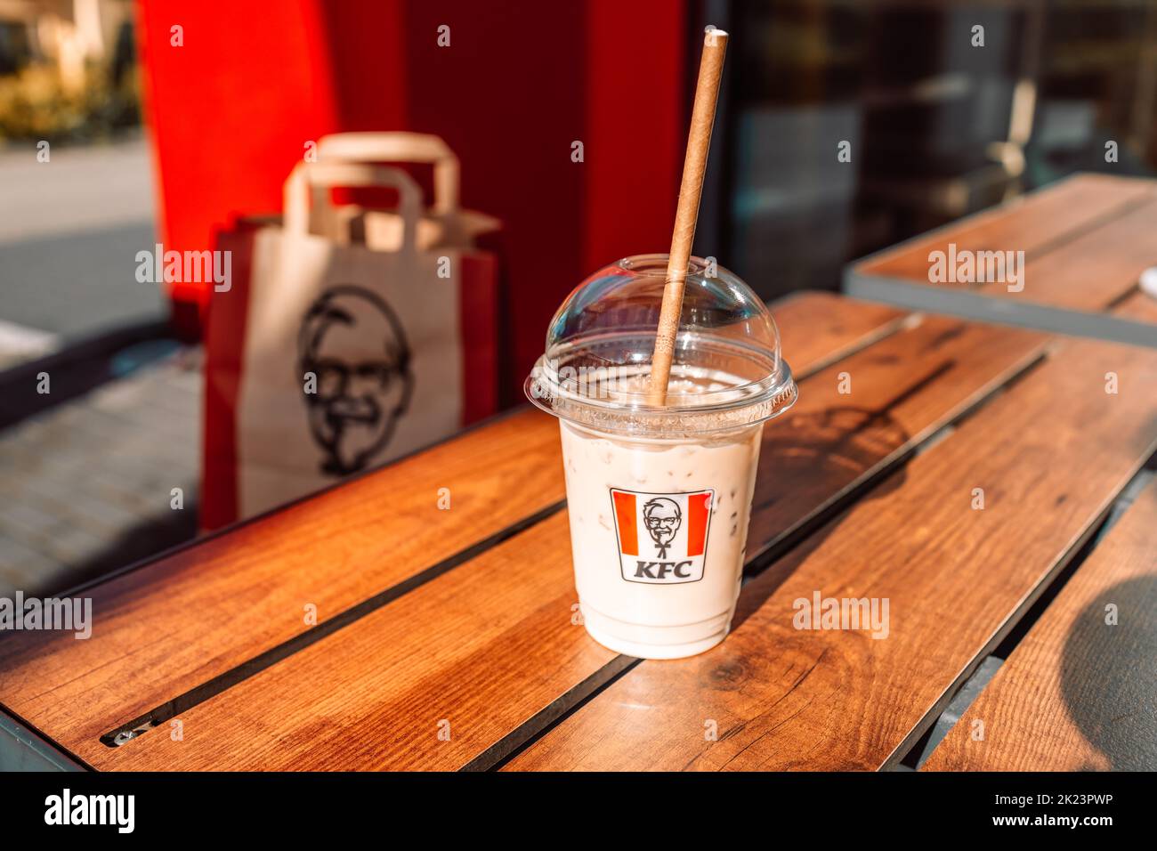 Krakow, Poland September 11 2022 Plastic cup of ice coffee latte