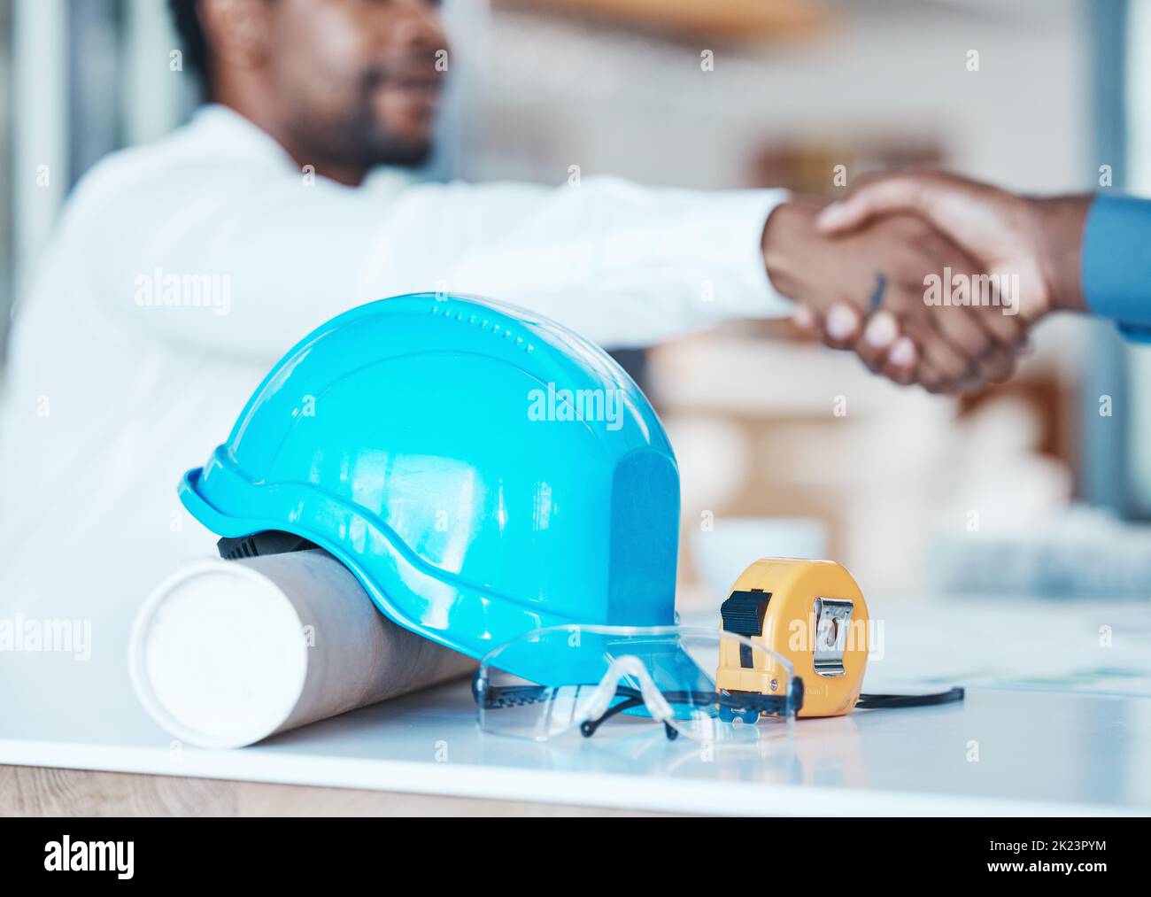 Architect partnership, client handshake and construction worker meeting for thank you, deal or onboarding. Businessman and contractor shaking hands Stock Photo