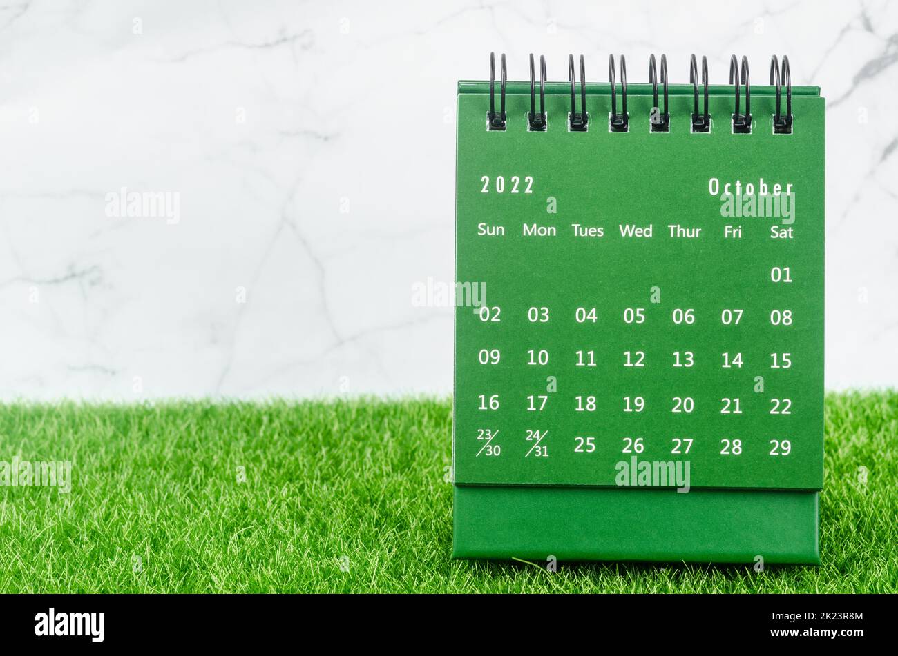 Green October 2022 Monthly desk calendar for 2022 year on grass. Stock Photo