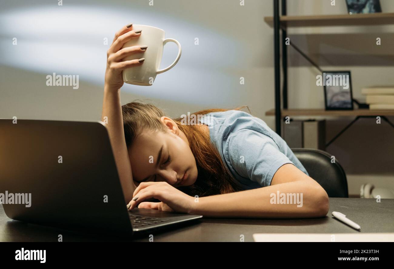 Workaholic lifestyle. Working late. Remote job. Tired business woman