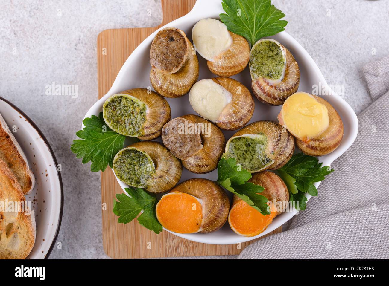Baked snails Escargot with bread Stock Photo Alamy