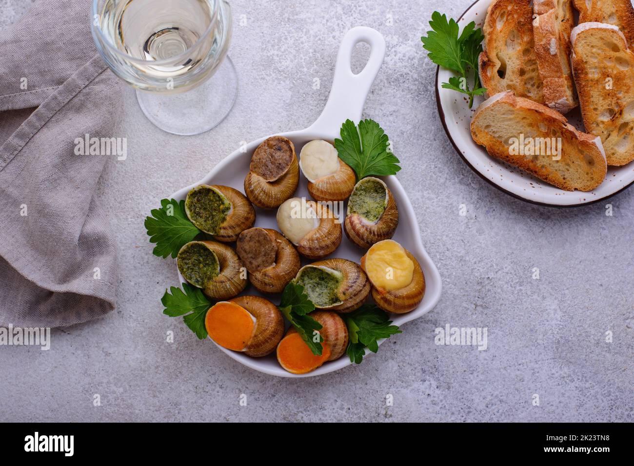 Baked snails Escargot with bread Stock Photo Alamy