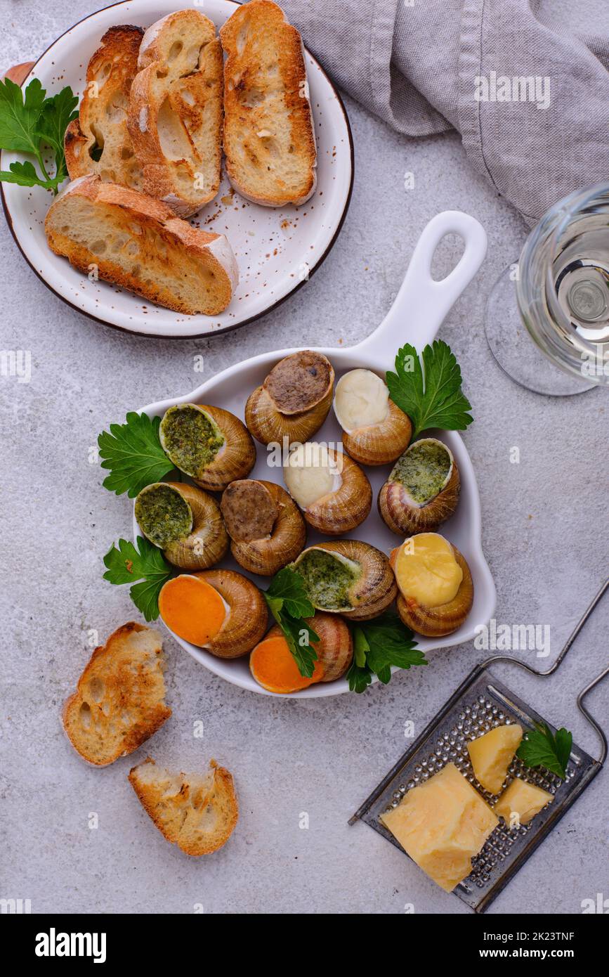 Baked snails Escargot with bread Stock Photo Alamy