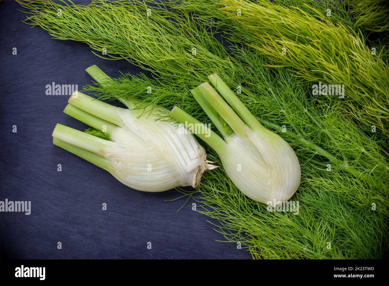 Fresh raw celery wih leaves on black background Stock Photo
