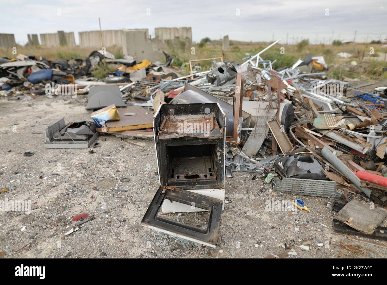 Destroyed oven in a scrap yard. Stock Photo