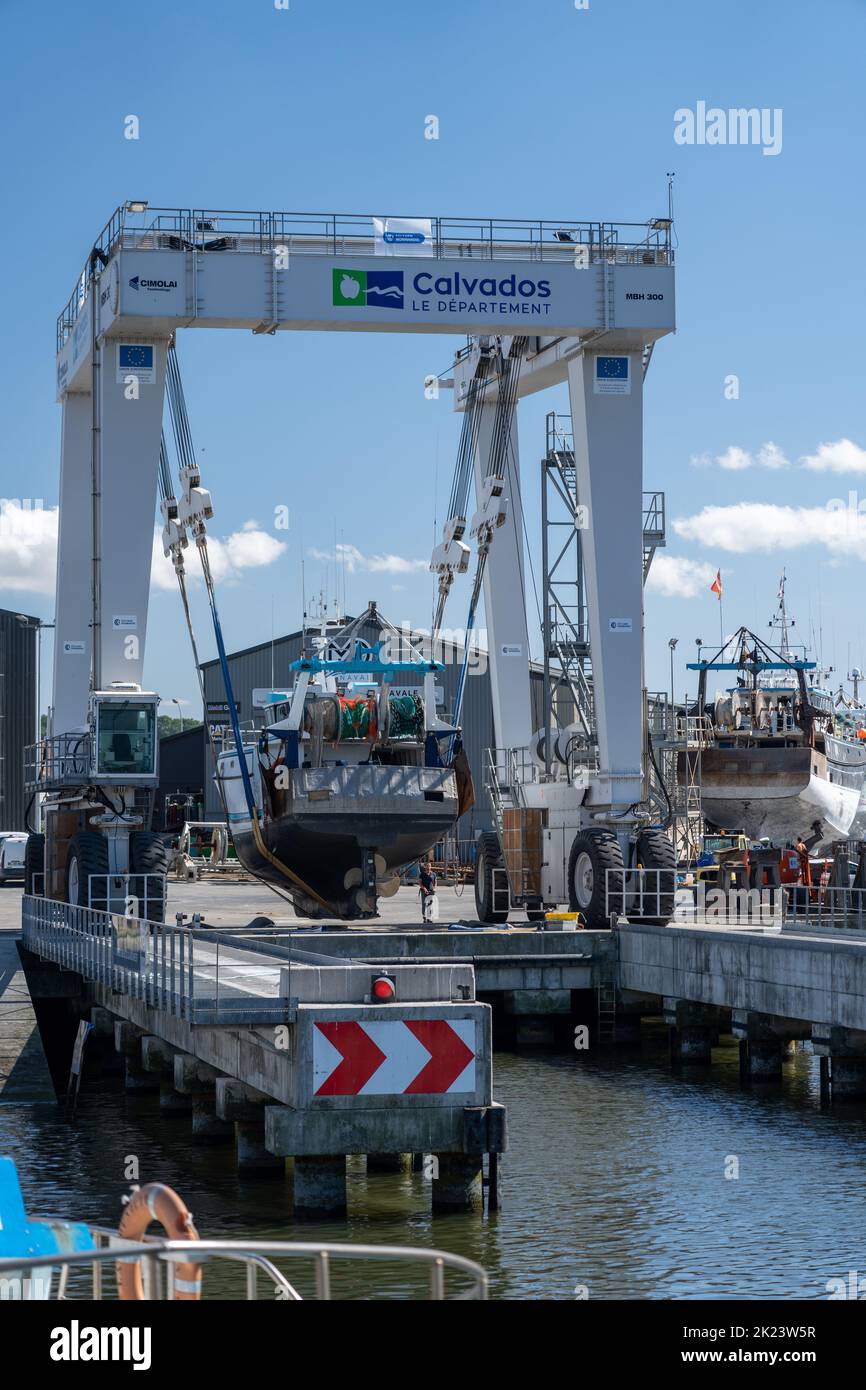 The new motorised boat lift at Port-en-Bessin, Normandy Stock Photo