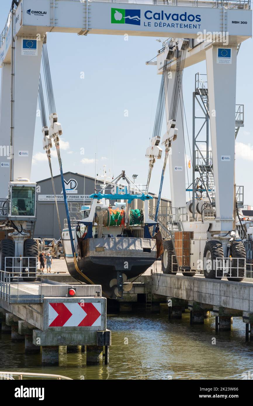 The new motorised boat lift at Port-en-Bessin, Normandy Stock Photo