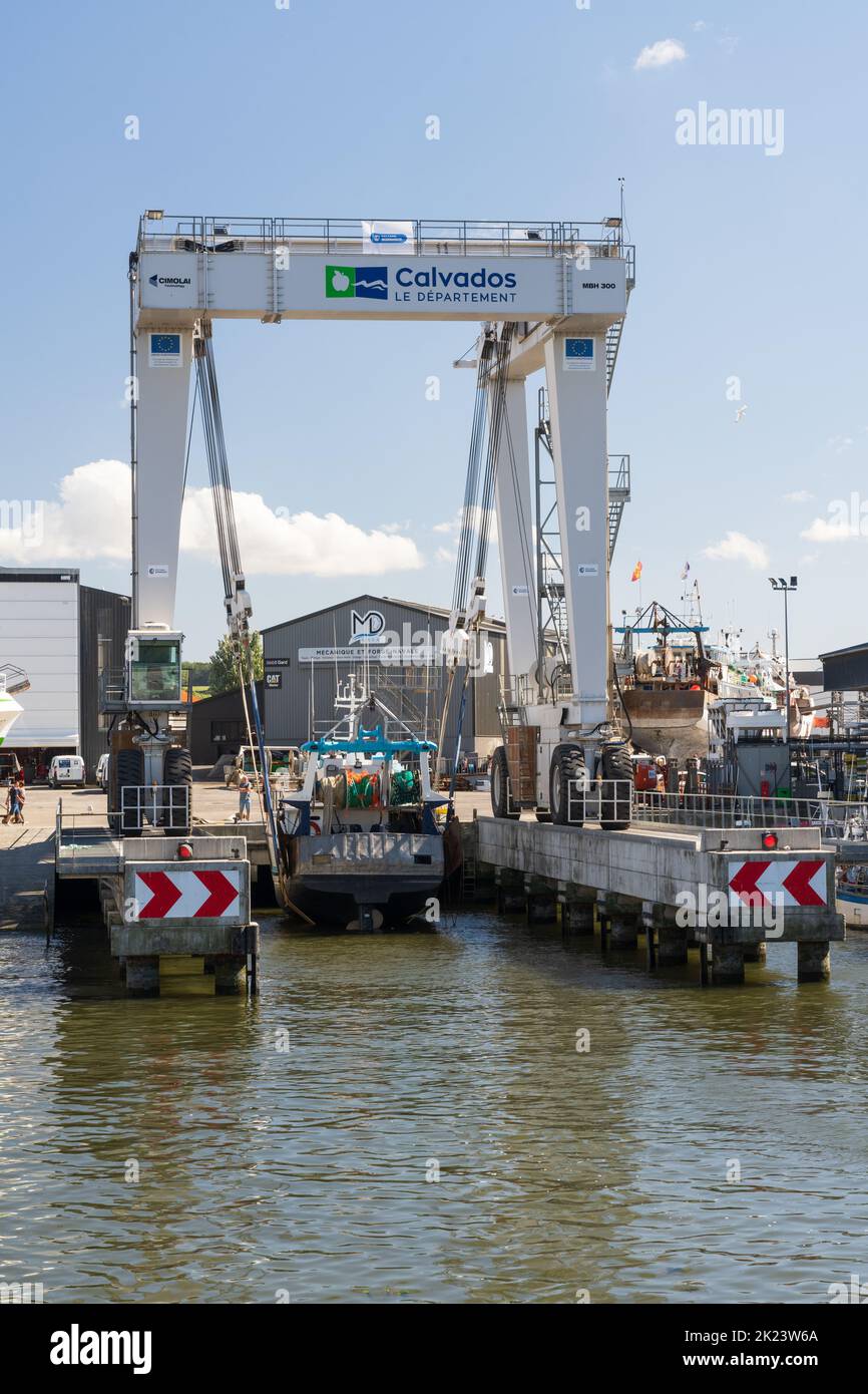The new motorised boat lift at Port-en-Bessin, Normandy Stock Photo