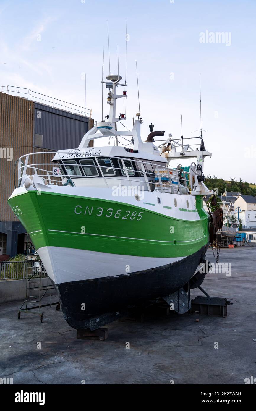 Sea fishing trawlers undergoing repairs at the boatyard in Port-en-Bessin Stock Photo