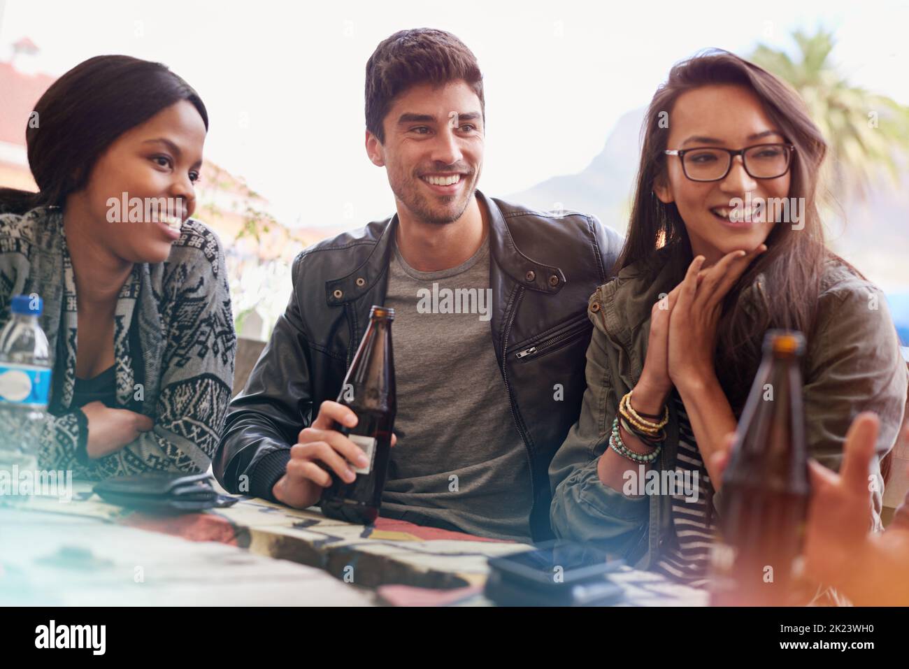 Friends always ready to listen. a group of friends drinking outdoors