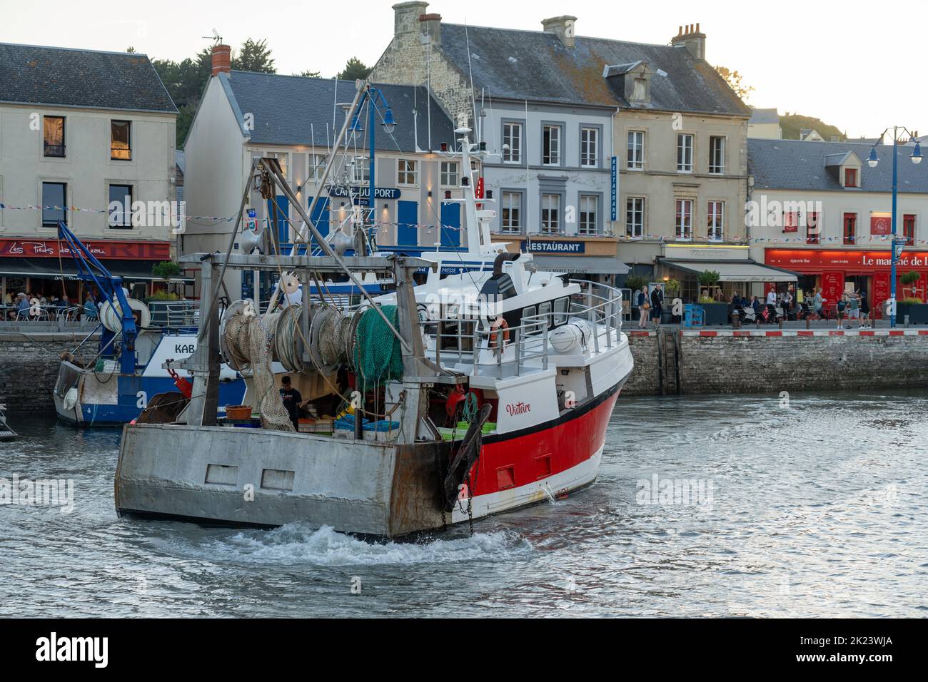 Sea fishing trawler leaving the docks at Port-en-Bessin Stock Photo - Alamy