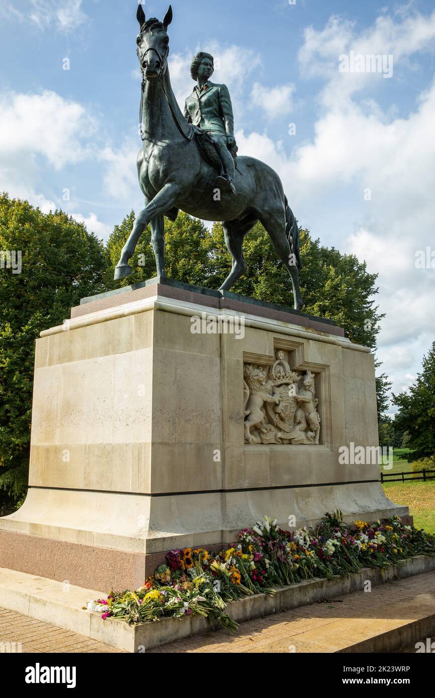 Windsor, UK. 22nd September, 2022. Floral tributes are pictured in front of an equestrian-themed statue of Elizabeth II in Windsor Great Park. The statue, featuring a bronze sculpture by Philip Jackson, was a Golden Jubilee gift from the Crown Estate. Queen Elizabeth II, the UK's longest-serving monarch, died at Balmoral aged 96 on 8th September 2022 after a reign lasting 70 years. Credit: Mark Kerrison/Alamy Live News Stock Photo