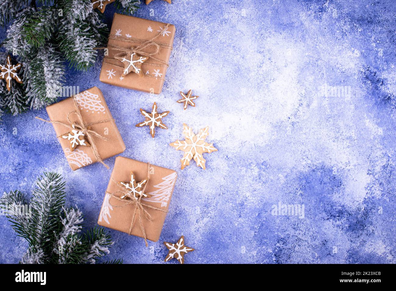 Christmas gift boxes on blue background Stock Photo - Alamy