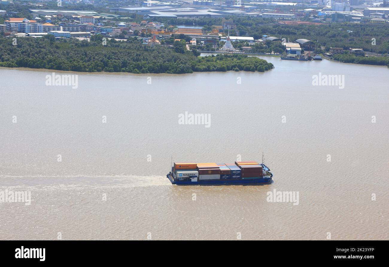 Logistics and shipping transportation on river, Oil gas tanker and goods ships vessel on river to the ocean. international import export cargo vessel Stock Photo