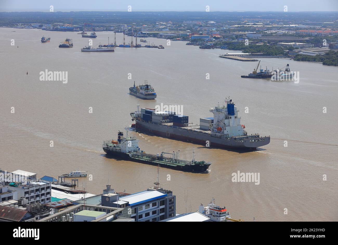Logistics and shipping transportation on river, Oil gas tanker and goods ships vessel on river to the ocean. international import export cargo vessel Stock Photo